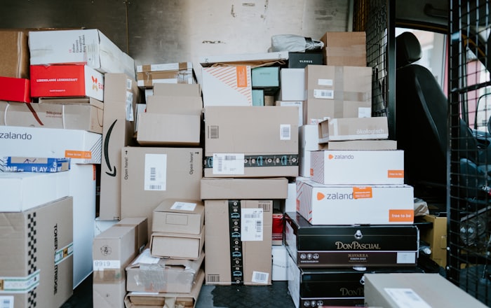 door to door international courier in Ernakulam โ delivery van with parcels